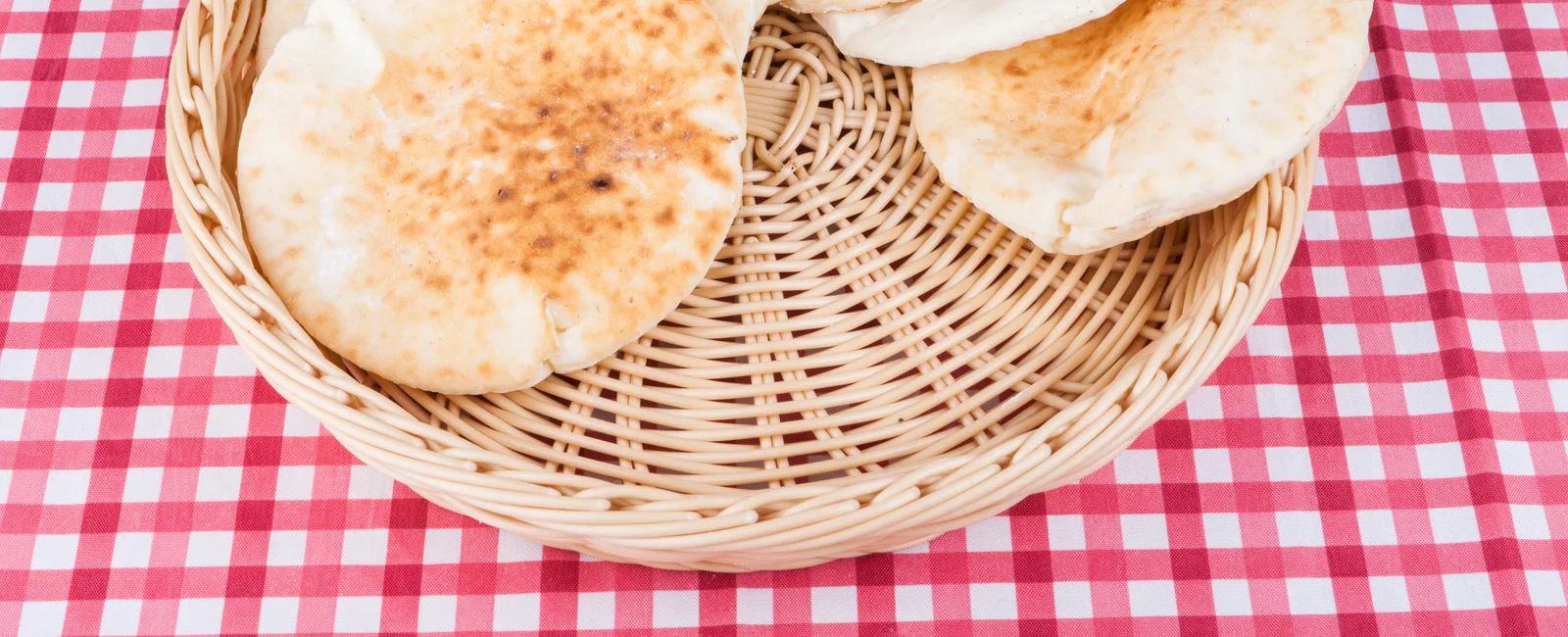 Pita bread in a wicker basket